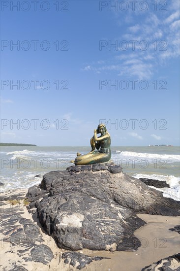 Golden mermaid sculpture on Samila beach