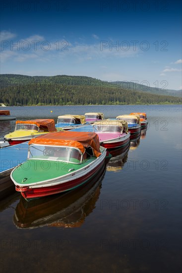 Colorful paddle boats on Lake Schluchsee