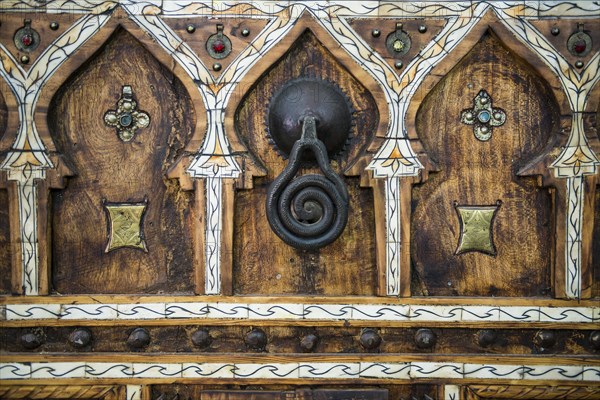 Old artfully decorated door