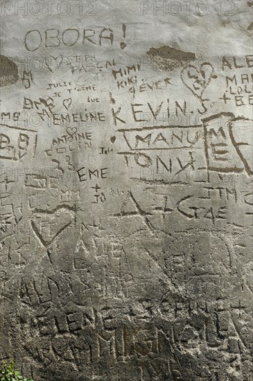 Names carved into the walls of the citadel of Saint Florent