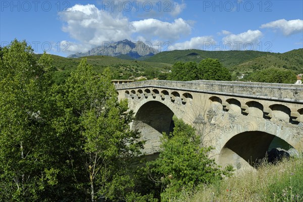 Old bridge over the river Golo