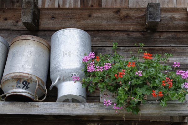 Milk cans drying at a mountain inn