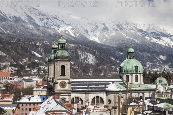 View from the town tower onto the city with the cathedral and the Karwendel Mountains