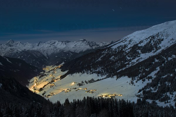 Illuminated mountain village