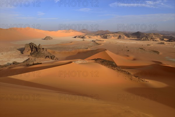 Sanddunes and rock towers at Ouan Zaouatan