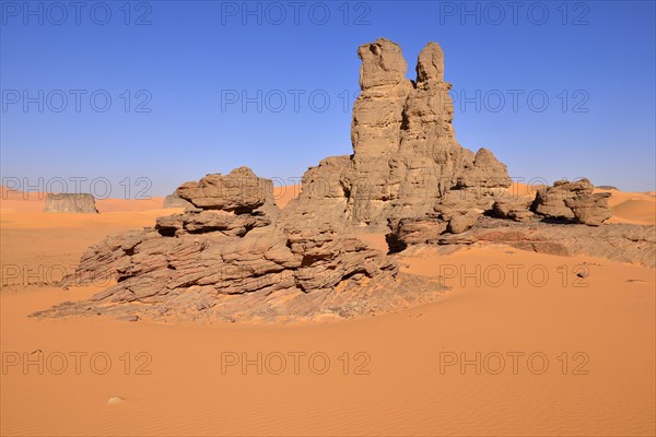 Sanddunes and rock towers at Moul Naga