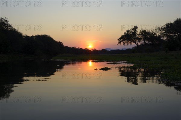 Sunset at a branch of the Zambezi river