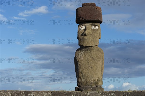 Moai wearing a Pukao topknot