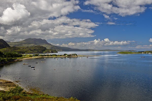 Headland with Ardmair Point Holiday Centre at Loch Kanaird in Ullapool