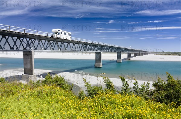 Caravan driving over Haast River Bridge