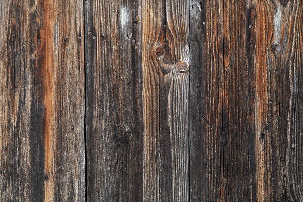 Old wooden boards on a barn wall