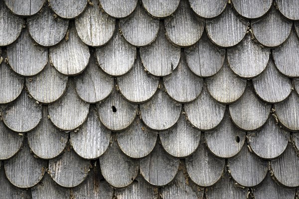 Old wood shingles on a farmhouse