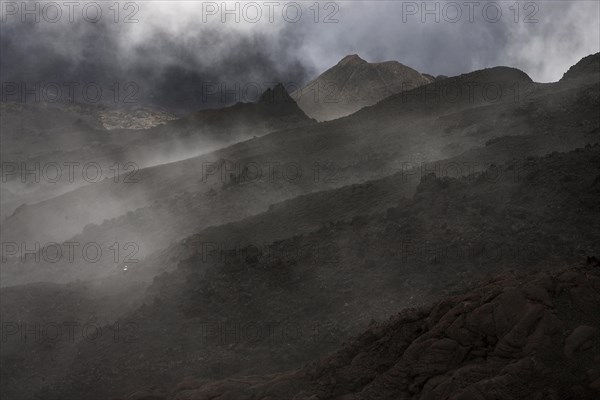 Volcanic landscape with clouds