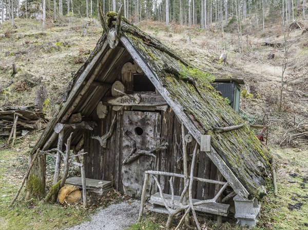 Quaint woodcutter's hut in the forest