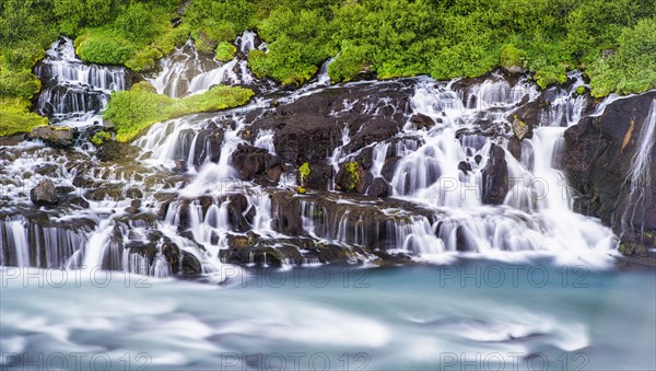 Hraunfossar Waterfalls with river Hvita