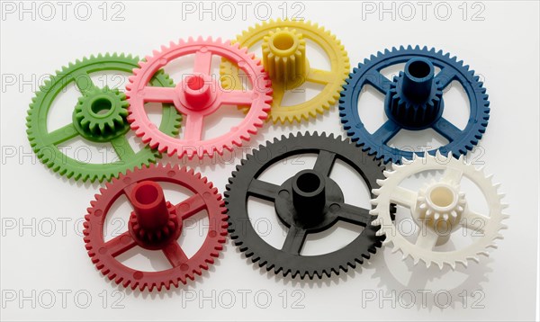 Coloured gears connected together