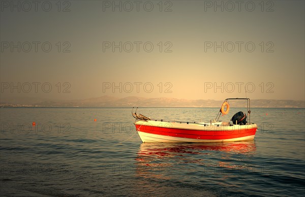 Motorboat anchored in the sea at Agia Galini