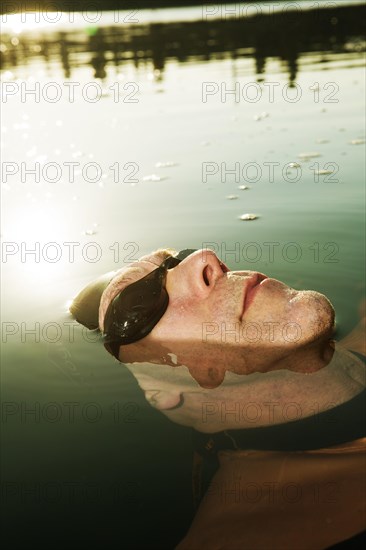 Man with swimming goggles