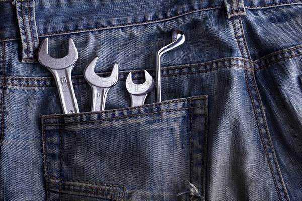 Wrench in a pocket jeans