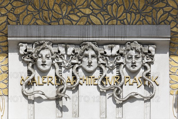 Three women's faces on the Secession building for Contemporary Art