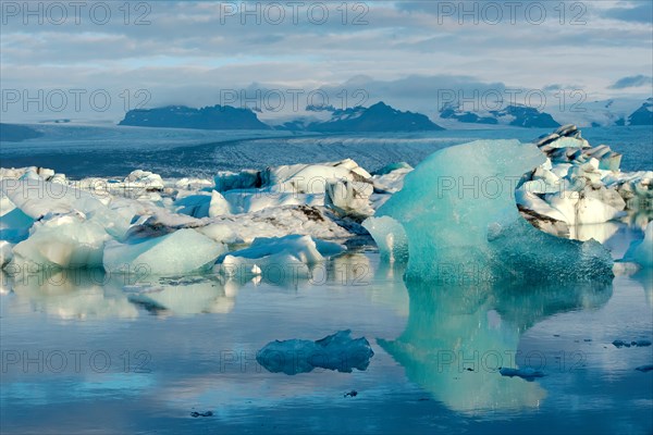 Blue iceberg floating in the lake