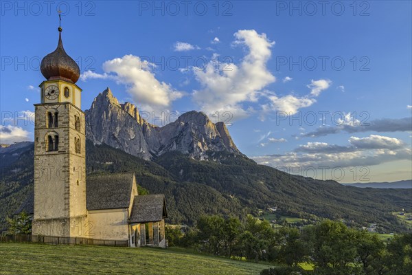 San Valentino church in front of the Schlern at sunset