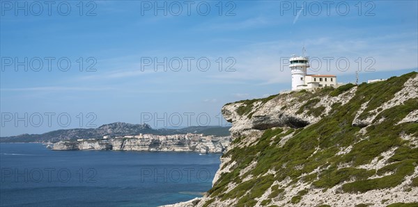 Lighthouse by the steep coast
