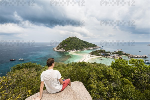 Young man looking towards Koh Nang Yuan