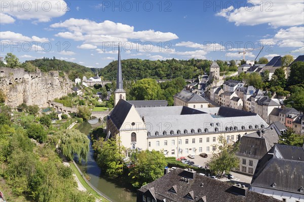 Neumunster Abbey in the Grund district behind former fortress wall