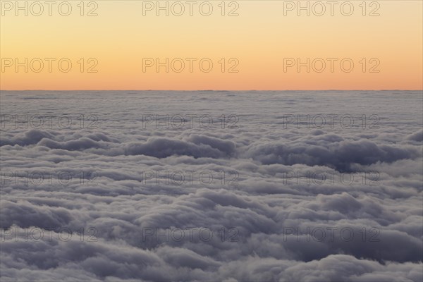 Sunset above the clouds