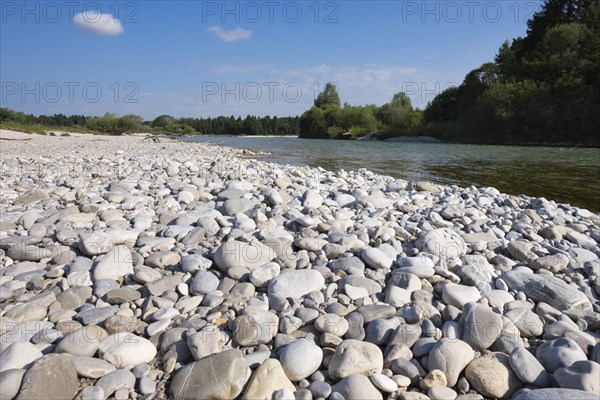 Pebble riverbank by the river Isar