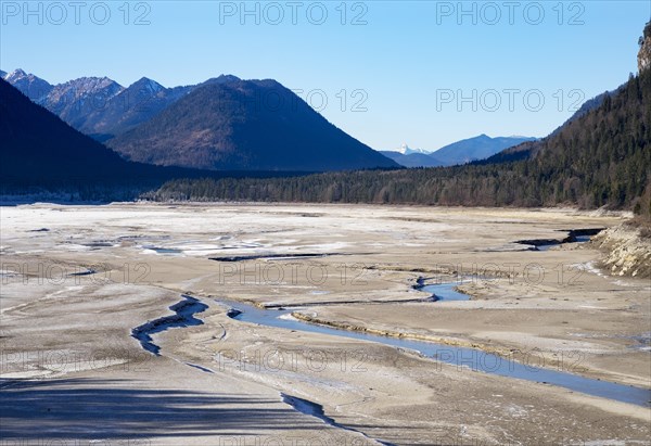 Isar river in the drained Sylvenstein Reservoir