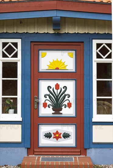 Traditionally painted door of a captain's house