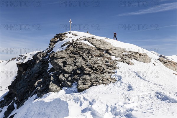 Ski tourers ascending Madritschspitze in Martell