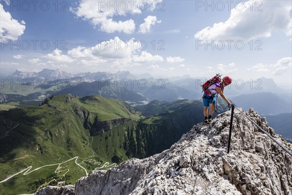 Climbers on Via Ferrata Eterna near Marmolada