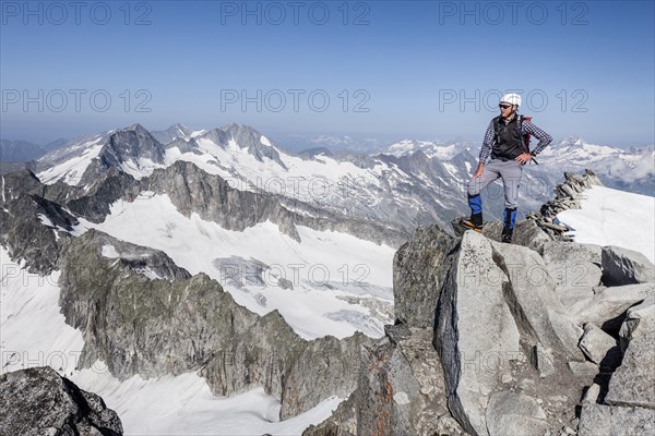 Mountaineer on Schwarzenstein summit ridge