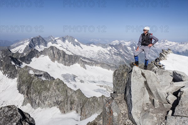 Mountaineer on Schwarzenstein summit ridge
