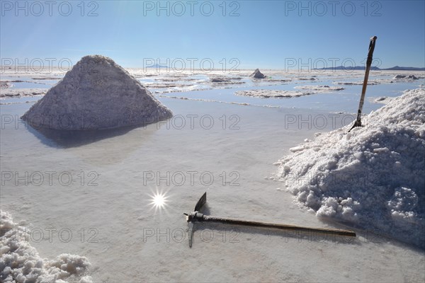 Traditional salt mining with pick and shovel