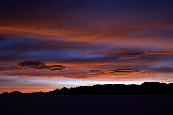 Colorful sunset at the salt lake Salar de Uyuni