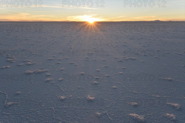 First rays of sunlight on Salar de Uyuni