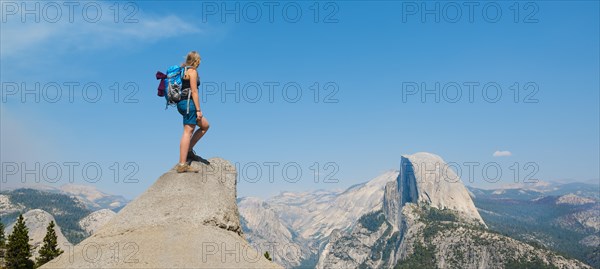 Hiker standing on a cliff
