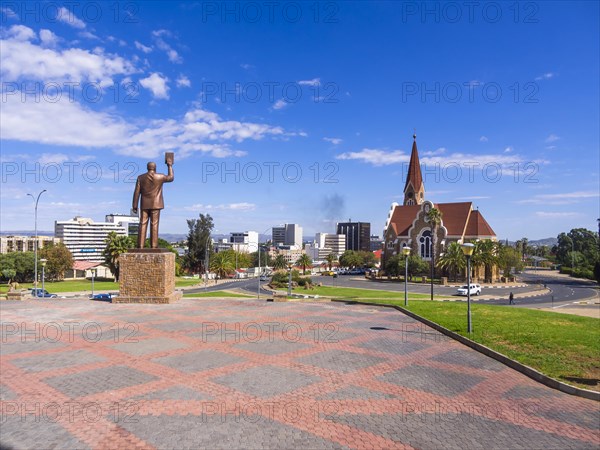 Statue of Dr. Sam Nujoma with Church of Christ