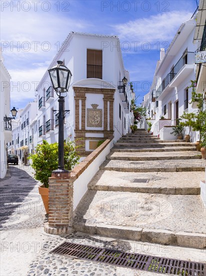 White houses in narrow alleyway