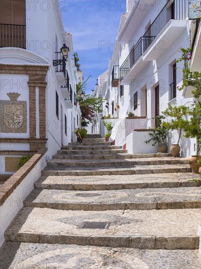 White houses in narrow alleyway