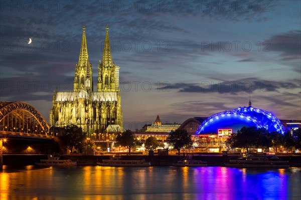 City-panorama of Cologne at dusk