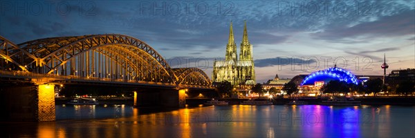 City-panorama of Cologne at dusk