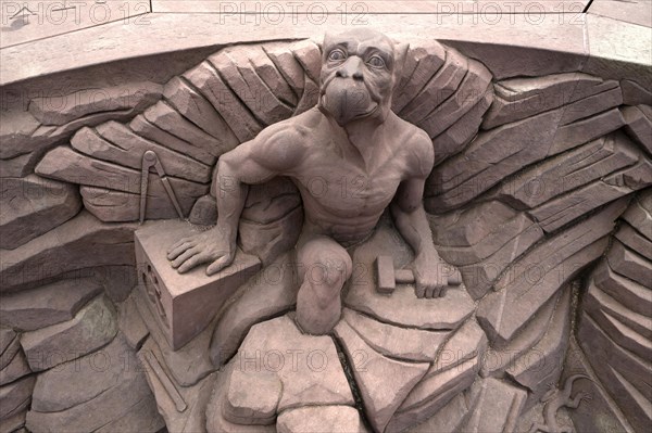 Sandstone sculpture of a chimera on the Place du Chateau