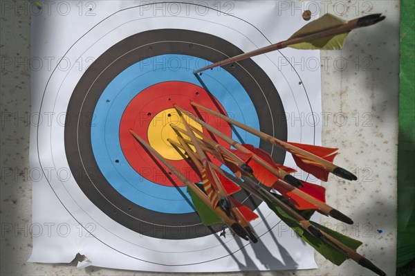 Archery target with arrows