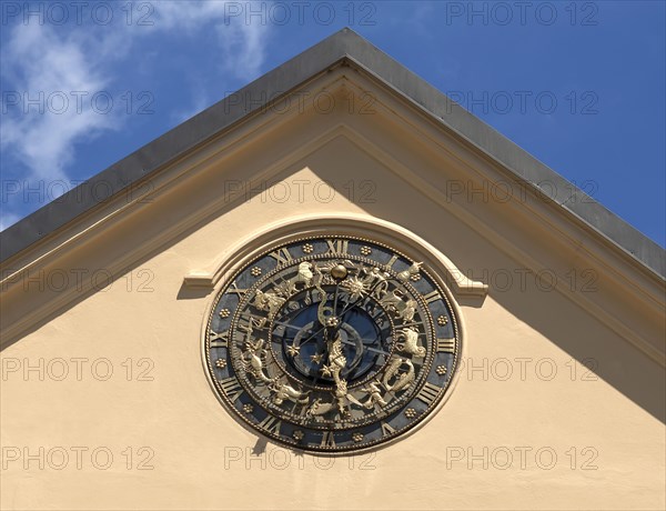 Astrological clock on a house