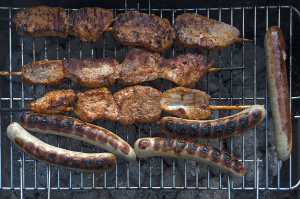 Grilled meat on a charcoal grill